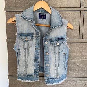 Distressed denim vest